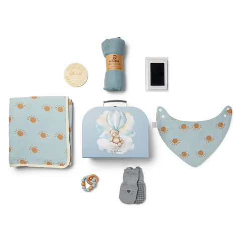 Everything in the blue Babanaz baby gift set, laid out