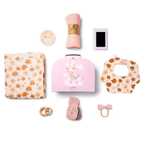 Everything in the pink Babanaz baby gift set, laid out